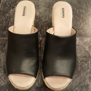 Black leather wedges